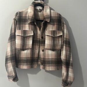 Really cute flannel jacket. Pretty thick and warm. Pink and Gray plaid. Size Lar